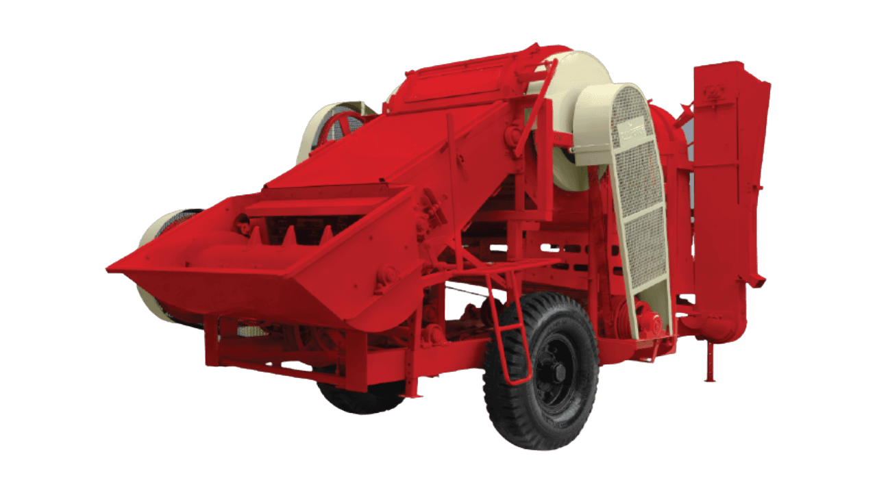 A trailed thresher on pneumatic wheels, the kind of machine Indian manufacturers export
